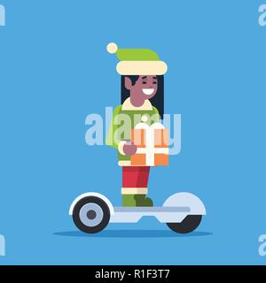 elf girl santa claus helper ride electric scooter merry christmas holiday new year concept flat Stock Vector