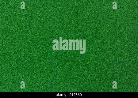 Green poker table felt background with shade vignette,Green felt fabric for background. Stock Photo