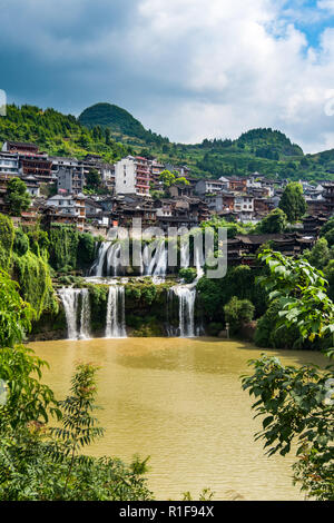 FURONG, HUNAN, CHINA, 10JUL2018: The Wangcun Waterfall at Furong Ancient Town Stock Photo
