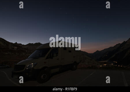 Mobile homes at night in the swiss alps Stock Photo