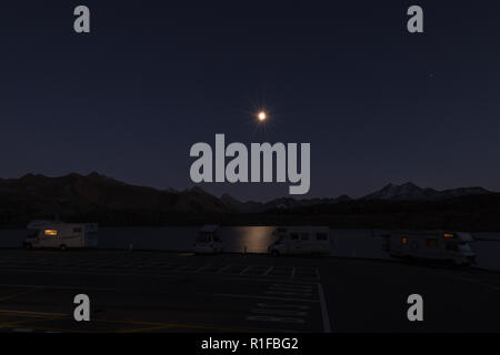 Mobile homes at night in the swiss alps Stock Photo