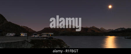 Mobile homes at night in the swiss alps Stock Photo