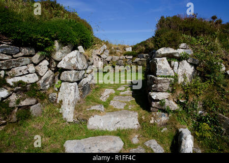 Stone building remains at Chysauster Ancient Iron Age Village, near Penzance, Cornwall, England Stock Photo