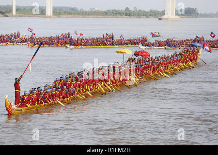 Prey Veng. 12th Nov, 2018. Photo taken on Nov. 12, 2018 shows oarsmen rowing the world's longest dragon boat (front) on the Mekong river in Prey Veng province, Cambodia. Cambodia's 87.3-meter-long wooden boat was recorded in the Guinness Book of Records as the world's longest dragon boat on Monday, breaking the previous record held by China. Credit: Sovannara/Xinhua/Alamy Live News Stock Photo