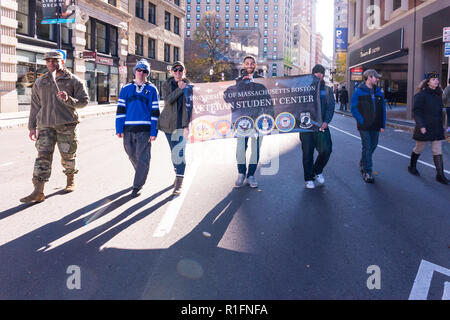 Boston, Massachusetts, USA. 11th November, 2018. Students from the UMASS Boston Veteran Student Center walking in the 2018 Boston Veterans' Day Parade. Maia Kennedy/Alamy Live News Stock Photo