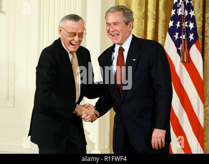 Washington, DC. 17th Nov, 2008. Washington, DC - November 17, 2008 -- United States President George W. Bush congratulates Stan Lee, founder of POW! Entertainment before presenting him with the 2008 National Medals of Arts award during an event in the East Room at the White House on Monday, November17, 2008 in Washington, DC. During the event president Bush presented recipients with awards for the National Medals of Arts and the National Humanities Medal. Credit: Mark Wilson - Pool via CNP | usage worldwide Credit: dpa/Alamy Live News Stock Photo