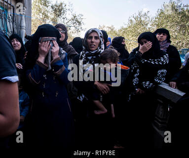 Gaza, Palestine. 12th Nov 2018. Relatives of Palestinian Mostafa Hassan Abu Odeh, who was killed in an Israeli air strike, mourn during his funeral, in Khan Younis. Credit: SOPA Images Limited/Alamy Live News Stock Photo