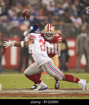 Santa Clara, CA, USA. 12th Nov, 2018. San Francisco 49ers middle linebacker Fred  Warner (48) knocks the ball loose from New York Giants running back Saquon  Barkley (26) in the second quarter