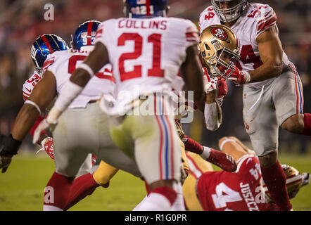 Santa Clara, CA, USA. 12th Nov, 2018. San Francisco 49ers running back Matt Breida (22) drives in the end zone for a touch down in the second quarter at Levi's Stadium on Monday, November 12, 2018 in Santa Clara. Credit: Paul Kitagaki Jr./ZUMA Wire/Alamy Live News Stock Photo