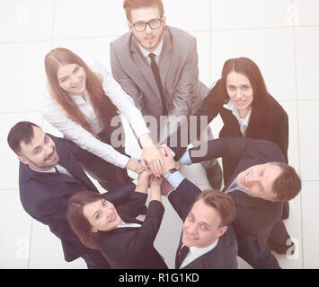 business team formed into a circle Stock Photo