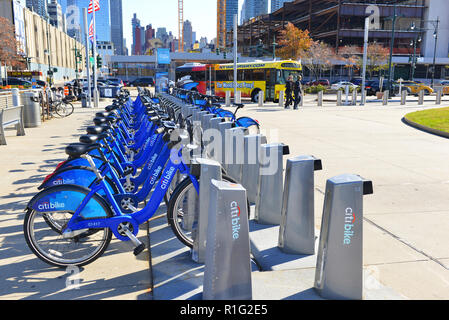 CitiBike, shown in Midtown is a Bicycle share program that helps reduce congestion and vehicular traffic in Manhattan Stock Photo