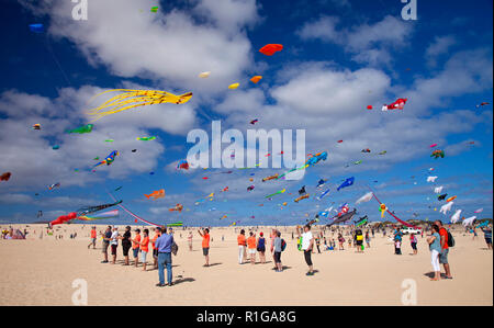 FUERTEVENTURA, SPAIN - NOVEMBER 10: Visitors enjoy beautiful display of flying kites of  at 31th International Kite Festival, November 10, 2018 in Nat Stock Photo