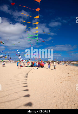 FUERTEVENTURA, SPAIN - NOVEMBER 10: Visitors enjoy beautiful display of flying kites of  at 31th International Kite Festival, November 10, 2018 in Nat Stock Photo