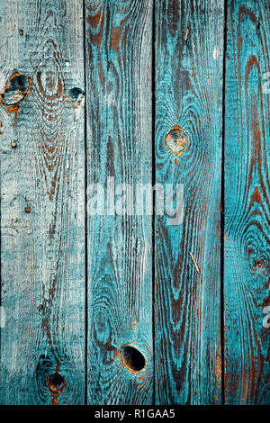 Old wooden wall with peeling paint, background or texture. Stock Photo