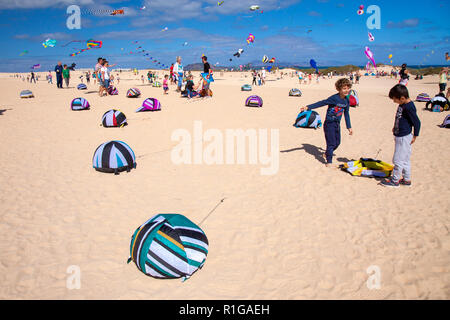 FUERTEVENTURA, SPAIN - NOVEMBER 10: Visitors enjoy beautiful display of flying kites of  at 31th International Kite Festival, November 10, 2018 in Nat Stock Photo