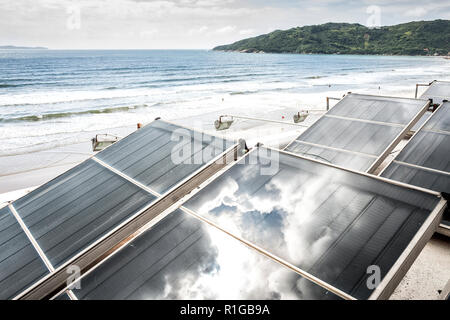Solar energy panels on the roof of a hotel. bombinhas, Santa Catarina, Brazil. Stock Photo