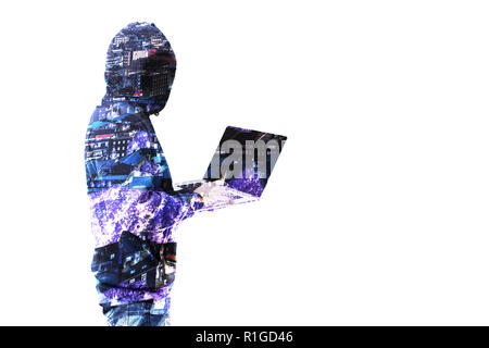 guy in the hood with notebook on the city background. Mixed media, hacker concept Stock Photo