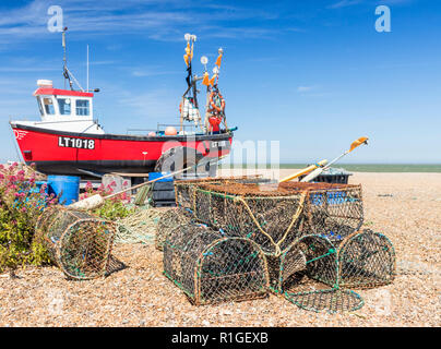 Aldeburgh Suffolk Aldeburgh traditional fishing boat and lobster pots on the beach Aldeburgh beach Suffolk England UK GB Europe Stock Photo