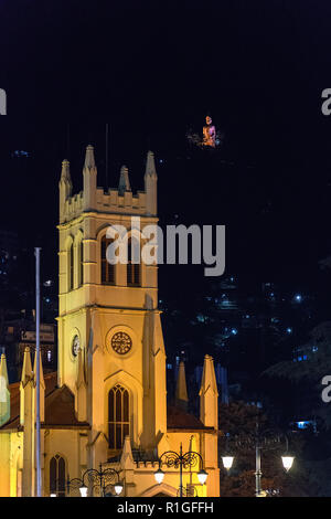 Christ Church in Shimla main Square with Jakhoo Hanuman Statue upside in background Stock Photo