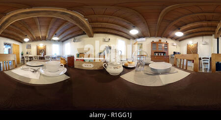 360 degree panoramic view of table set ready to have breakfast with tea, coffee and pastries