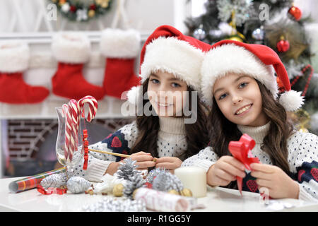Portrait of happy girls preparing for Christmas Stock Photo