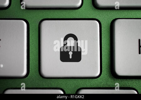 Image of padlock icon on computer keyboard button data security Stock Photo