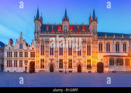 Scenic cityscape with the picturesque night medieval Christmas Burg Square in Bruges, Belgium Stock Photo