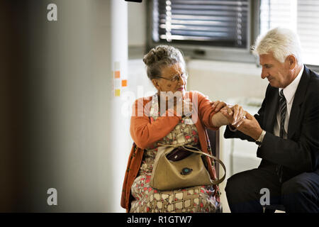 A check up done on an old lady by a doctor. Stock Photo