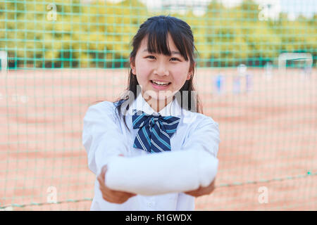 Japanese junior-high schoolgirl in uniform