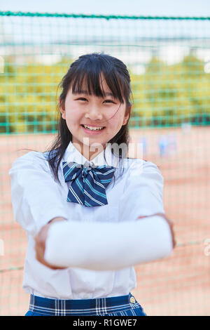 Japanese junior-high schoolgirl in uniform