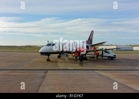 Logon Air SAAB 340 aircraft awaiting departure from Sumburgh Airport, Shetland Islands, Scotland. Stock Photo