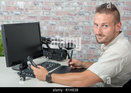 man video editor using a graphic tablet Stock Photo