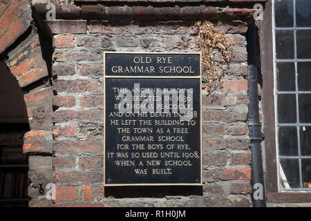 Sign outside doorway of the 17th Century former Grammar School, Rye, East Sussex. Stock Photo