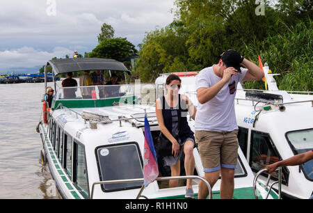 Tourists arriving at Cambodian International Border Checkpoint in boats on Mekong River from Vietnam. Kaam Samnor, Cambodia, southeast Asia Stock Photo