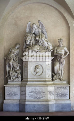 Marble cenotaph to Italian politician Giuseppe La Farina, who was an influential leader of the Italian Risorgimento, in the first cloister of the Basilica di Santa Croce (Basilica of the Holy Cross) in Florence, Tuscany, Italy. Stock Photo