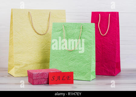 Crumple paper colorful shopping bags. Stock Photo