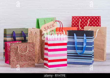 Multicolored paper shopping bags. Stock Photo