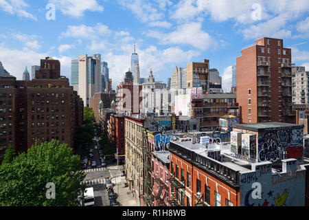 View from Manhattan Bridge to Madison Street, Chinatown and Graffities on the Roofs, New York City, USA Stock Photo