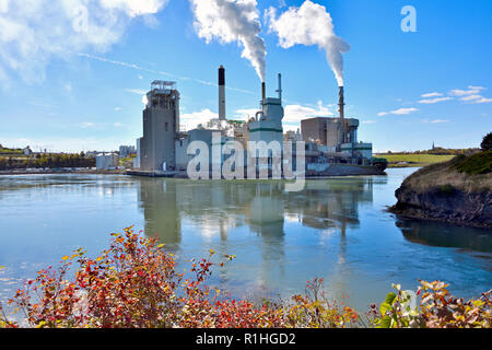 A horizontal image of the Irving pulp mill situated at the world famous Reversing Falls on the Saint John River in the city of Saint John New Brunswic Stock Photo