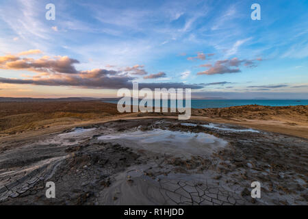 Mud volcanoes at sunset,  amazing natural phenomenon Stock Photo