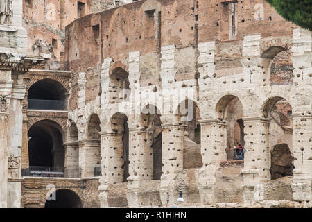 Mad clouds and Coliseum old building in Rome city, Italy Stock Photo
