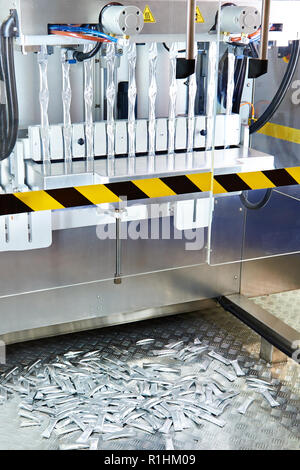 Machine for sealing plastic mini bags Stock Photo