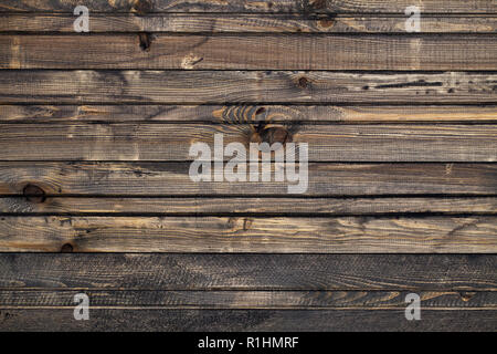 The old brown wood texture. Old grunge dark textured wooden background. Stock Photo
