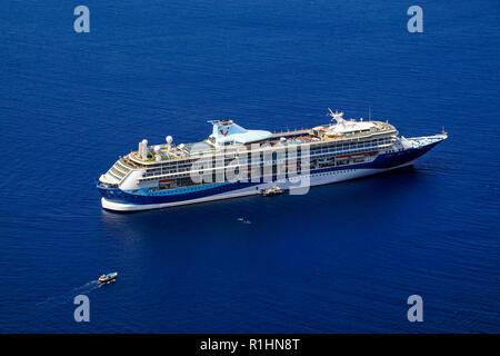 Marella Cruises cruise ship Marella Discovery 2 anchored at Island Santorini in Southern Aegean Sea Greece Europe Stock Photo