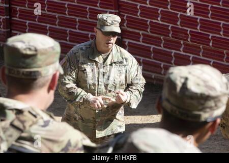 Sgt. 1st Class Bryan Ehrhart gives an IED detection lecture to soldiers of U.S. Army’s 1st Battalion, 23rd Infantry Regiment, and Indian army’s 99th Mountain Brigade Sept. 21, 2018, at Chaubattia Military Station, India. This was part of Yudh Abhyas, an exercise that enhances the joint capabilities of both the U.S. and Indian army through training and cultural exchange, and helps foster enduring partnerships in the Indo-Asia Pacific region. Stock Photo