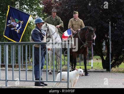 Brig. Gen. Frederick R. Maiocco Jr., commander of the U.S. Army Reserve’s 7th Mission Support Command, joined his Soldiers, reenactors and dignitaries from France and the U.S. in honoring the U.S. Army’s 16th Infantry Regiment, 1st Infantry Division’s historical crossing of the bridge at the village of Nonsard, France, during the WWI Centennial Celebration, Sept. 22, 2018. Stock Photo