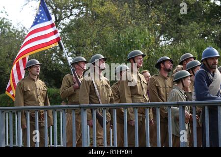 Brig. Gen. Frederick R. Maiocco Jr., commander of the U.S. Army Reserve’s 7th Mission Support Command, joined his Soldiers, reenactors and dignitaries from France and the U.S. in honoring the U.S. Army’s 16th Infantry Regiment, 1st Infantry Division’s historical crossing of the bridge at the village of Nonsard, France, during the WWI Centennial Celebration, Sept. 22, 2018. Stock Photo