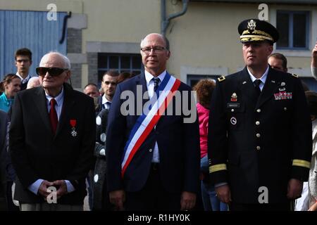 Brig. Gen. Frederick R. Maiocco Jr., commander of the U.S. Army Reserve’s 7th Mission Support Command, joined his Soldiers, reenactors and dignitaries from France and the U.S. in honoring the U.S. Army’s 16th Infantry Regiment, 1st Infantry Division’s historical crossing of the bridge at the village of Nonsard, France, during the WWI Centennial Celebration, Sept. 22, 2018. Stock Photo