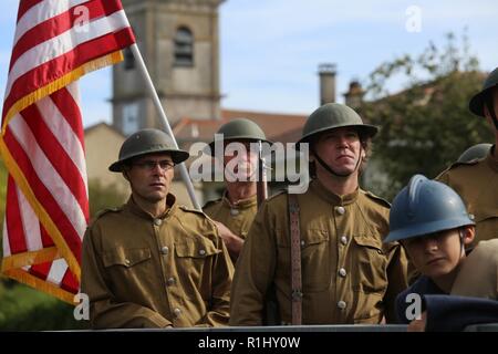 Brig. Gen. Frederick R. Maiocco Jr., commander of the U.S. Army Reserve’s 7th Mission Support Command, joined his Soldiers, reenactors and dignitaries from France and the U.S. in honoring the U.S. Army’s 16th Infantry Regiment, 1st Infantry Division’s historical crossing of the bridge at the village of Nonsard, France, during the WWI Centennial Celebration, Sept. 22, 2018. Stock Photo