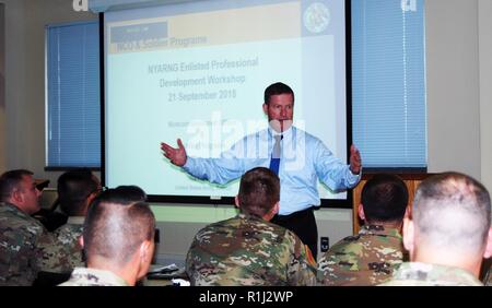 Retired Sergeant Major of the ArmyKenneth O. Preston speaks to New York Army National Guard noncommissioned officers during a NCO Professional Development Workshop held at Division of Military and Naval Affairs Headquarters in Latham, N.Y. on Sept. 21, 2018. Eighty NCOs attended the two-day course hosted by New York Army National Guard Command Sgt. Major David Piwowarski. Preston, who currently serves as the Vice President of NCO and Soldier Programs for the Association of the United States Army, was the Army's top NCO from 2004 to 2011. He spoke about the value of NCO education and the role N Stock Photo